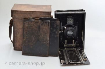 unknown wooden follding camera with STYLOR H.ROUSSEL PARIS 6.3/135